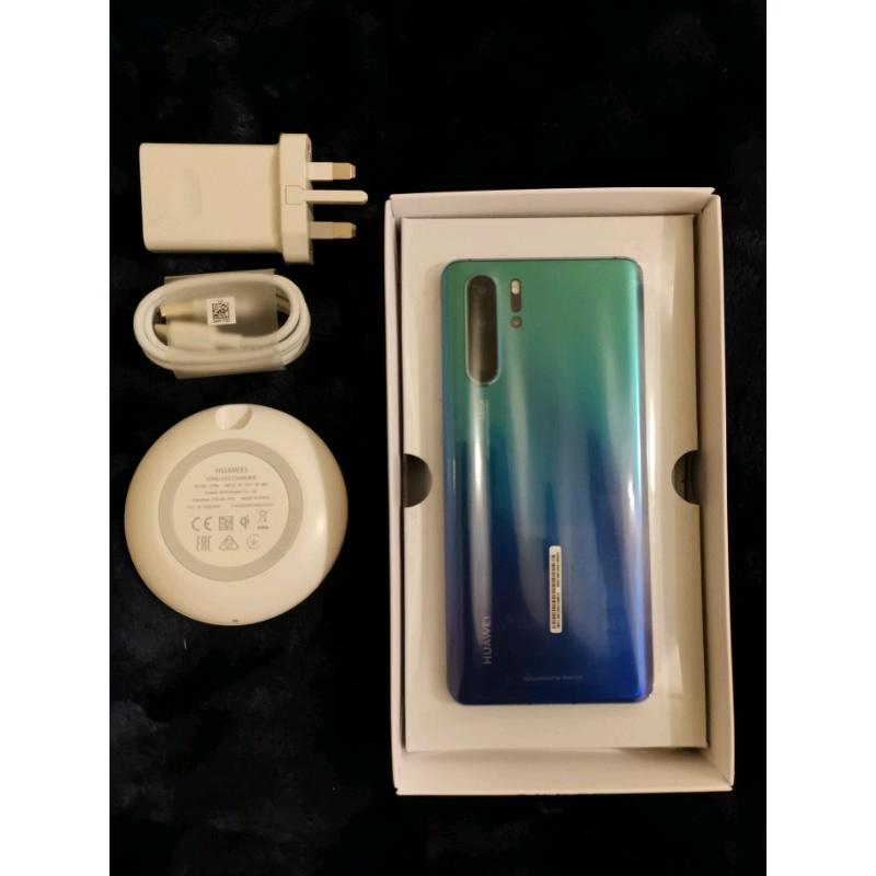 Huawei P30 pro 128GB with wireless charging pad.