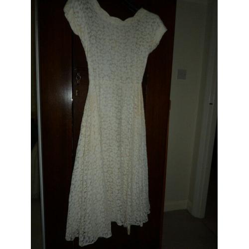 Vintage 1950s lace satin-lined wedding dress with fitted bodice and full skirt, calf / ankle length