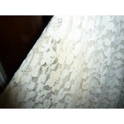 Vintage 1950s lace satin-lined wedding dress with fitted bodice and full skirt, calf / ankle length