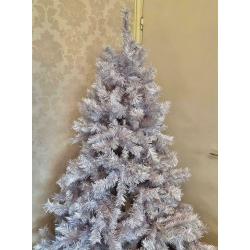 A stunning Grey 6ft Christmas Tree, has a slight sparkle. Easy to assemble. Like new.