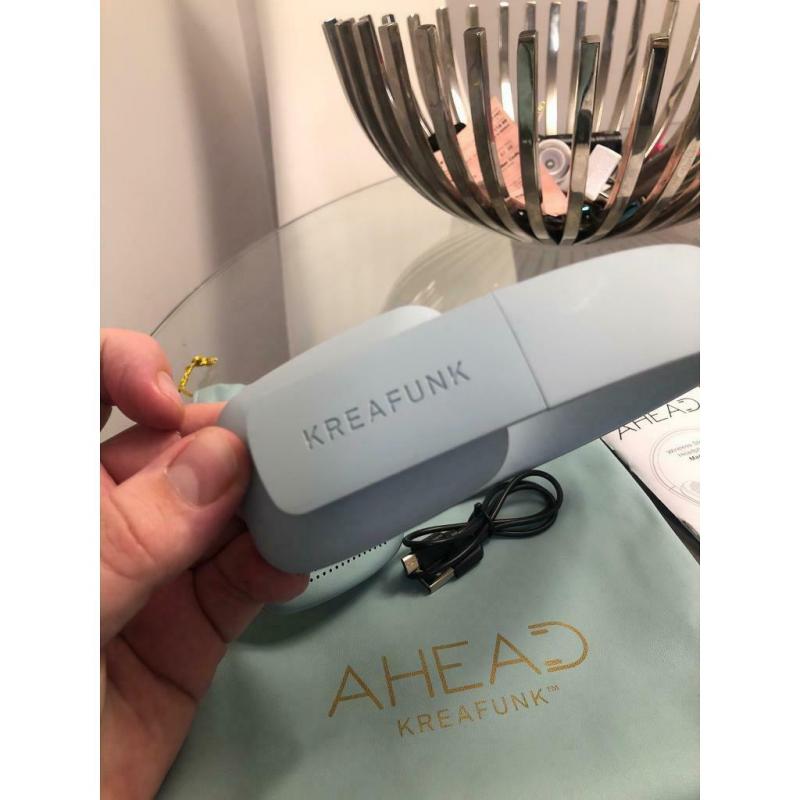 Ahead kreafunk turquoise wireless headphones