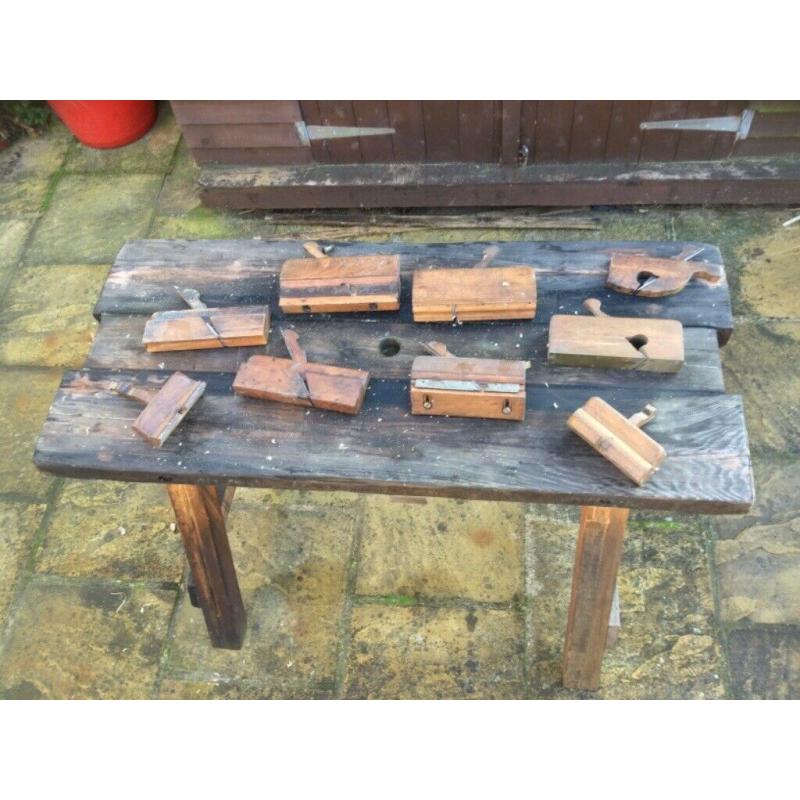 A collection of vintage hand moulding planes