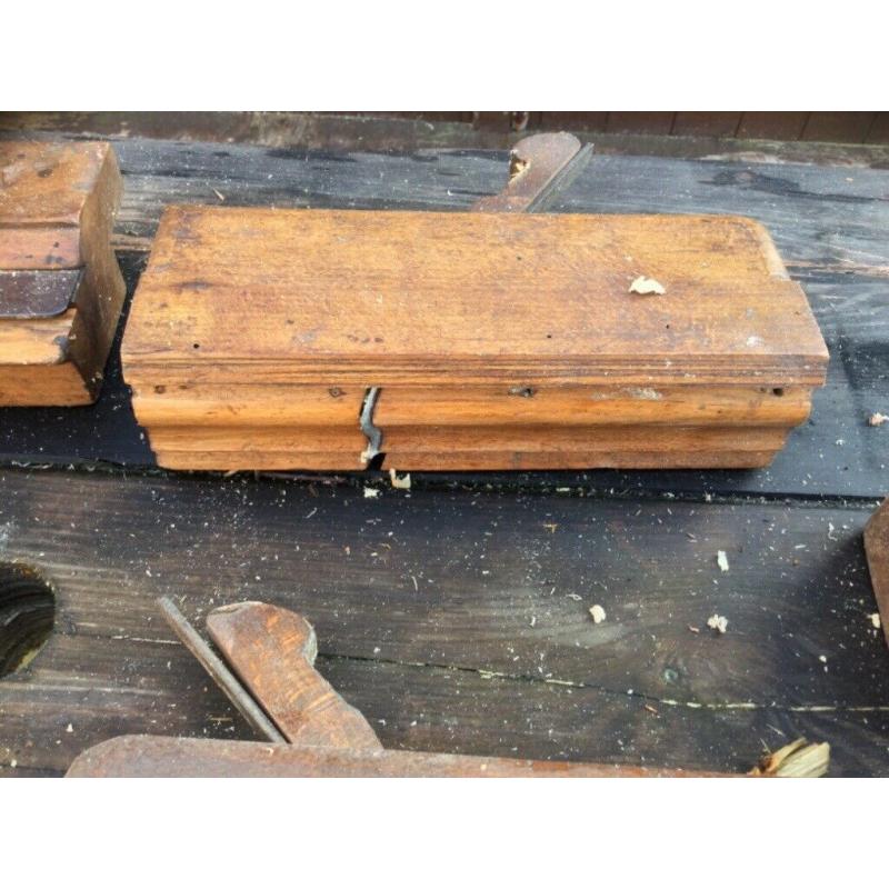 A collection of vintage hand moulding planes