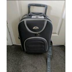 David Jolly branded - small carry on suitcase -Like new - used once with lock on top.