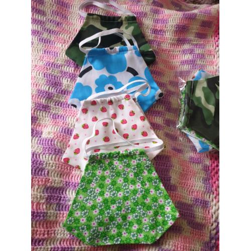 Sealed pack of four sanitized face masks