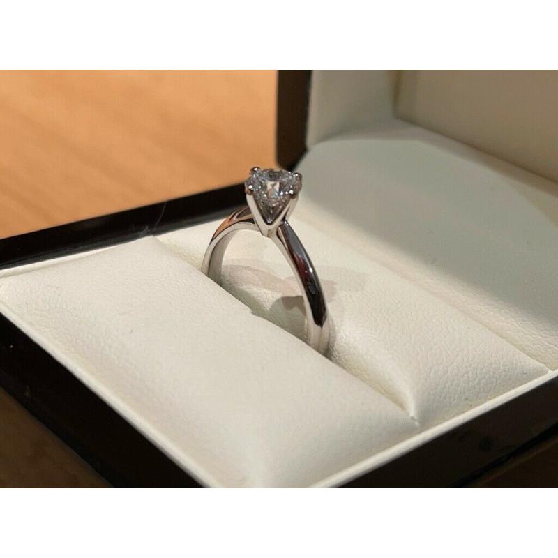0.75ct round brilliant cut D SI1 XXX GIA certified diamond bespoke platinum ring size K